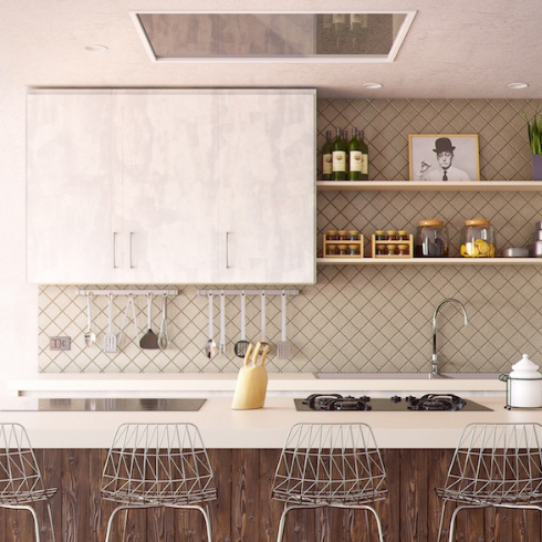 A brown and white kitchen with a diagonal tile backsplash and white upper cabinets that reach all the way to the ceiling.