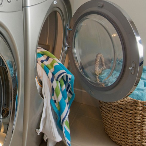 Washer and dryer with dirty clothes inside