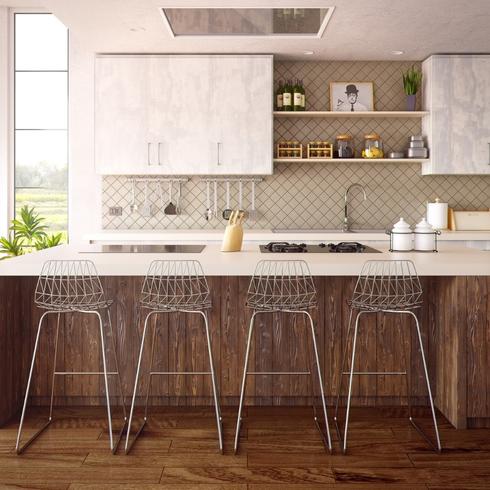 a kitchen with white counters and brown kitchen cabinet