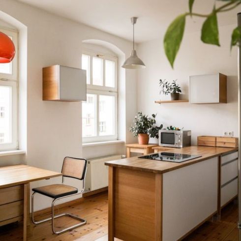 white kitchen with floating cabinets