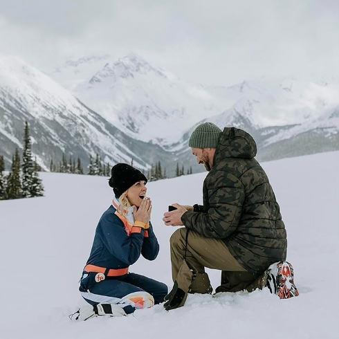 Kortney Wilson and her fiance Ryan proposing in snowy Whistler