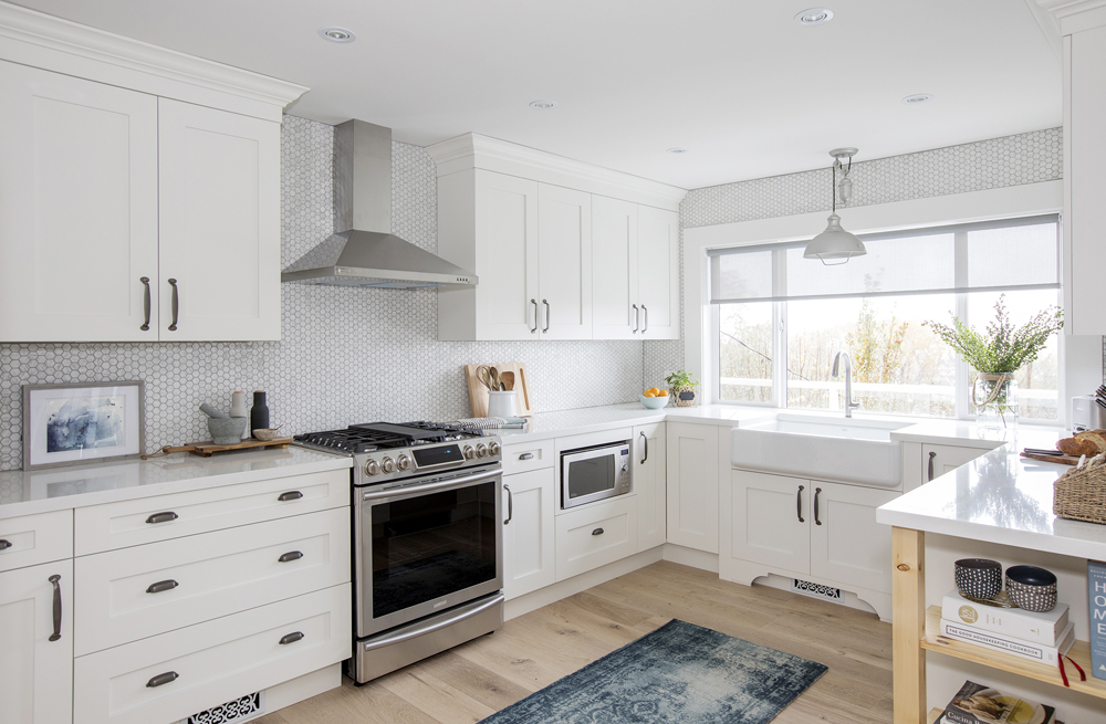 Fresh Feel Modern white kitchen with penny-tile backsplash.
