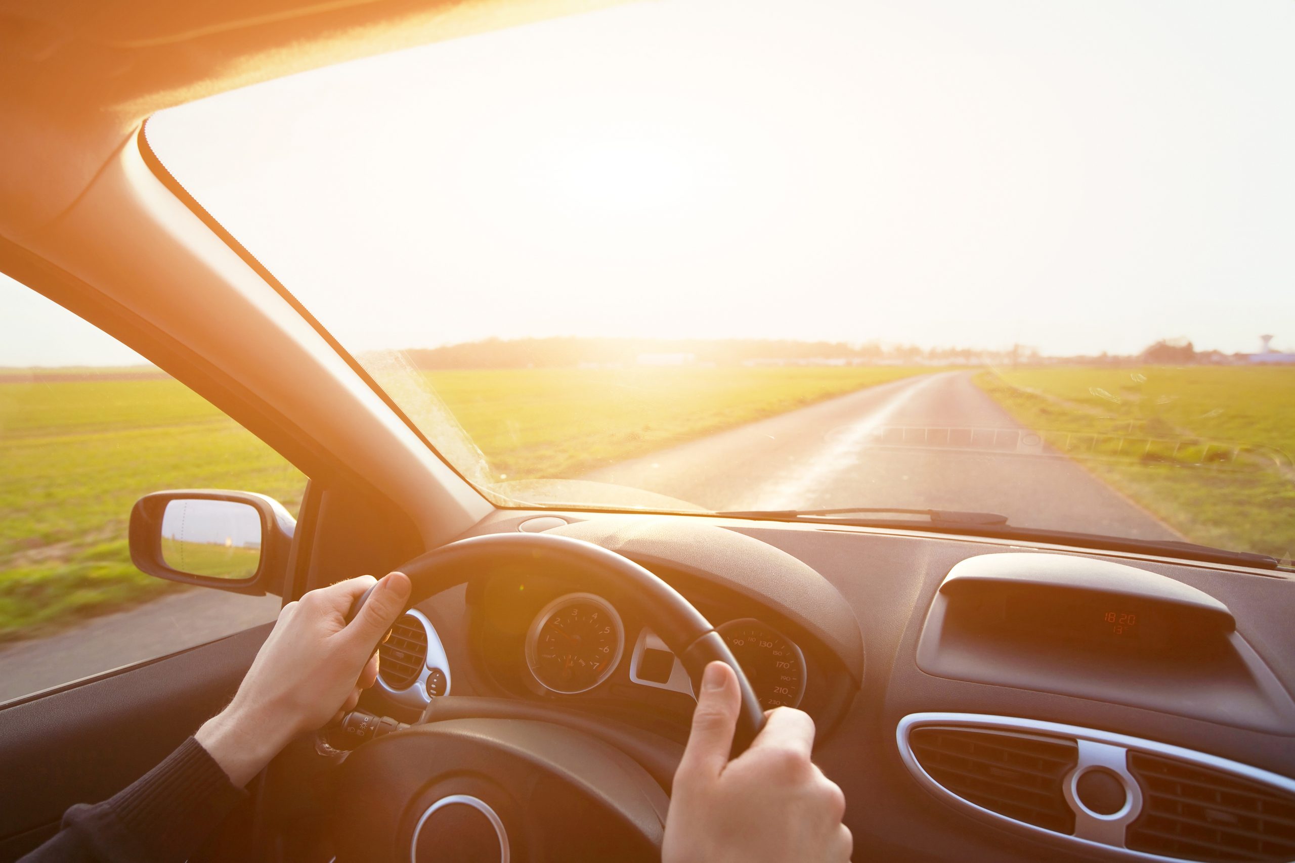 Hands on steering wheel driving vehicle