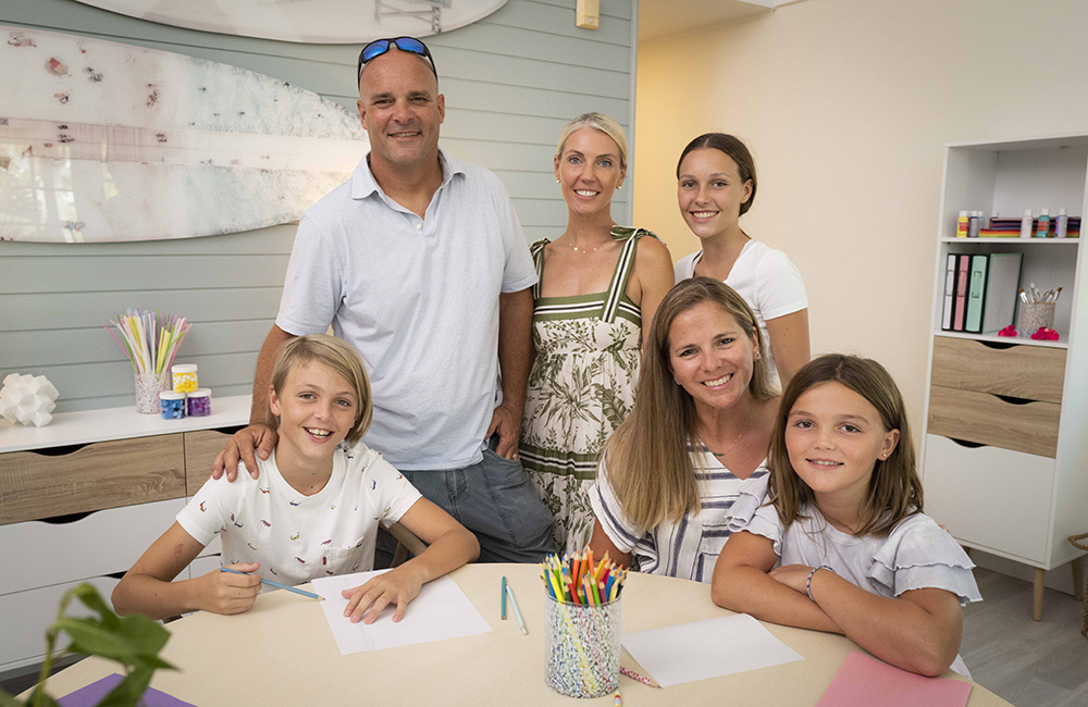 The Baeumlers in the school villa with their new teacher.