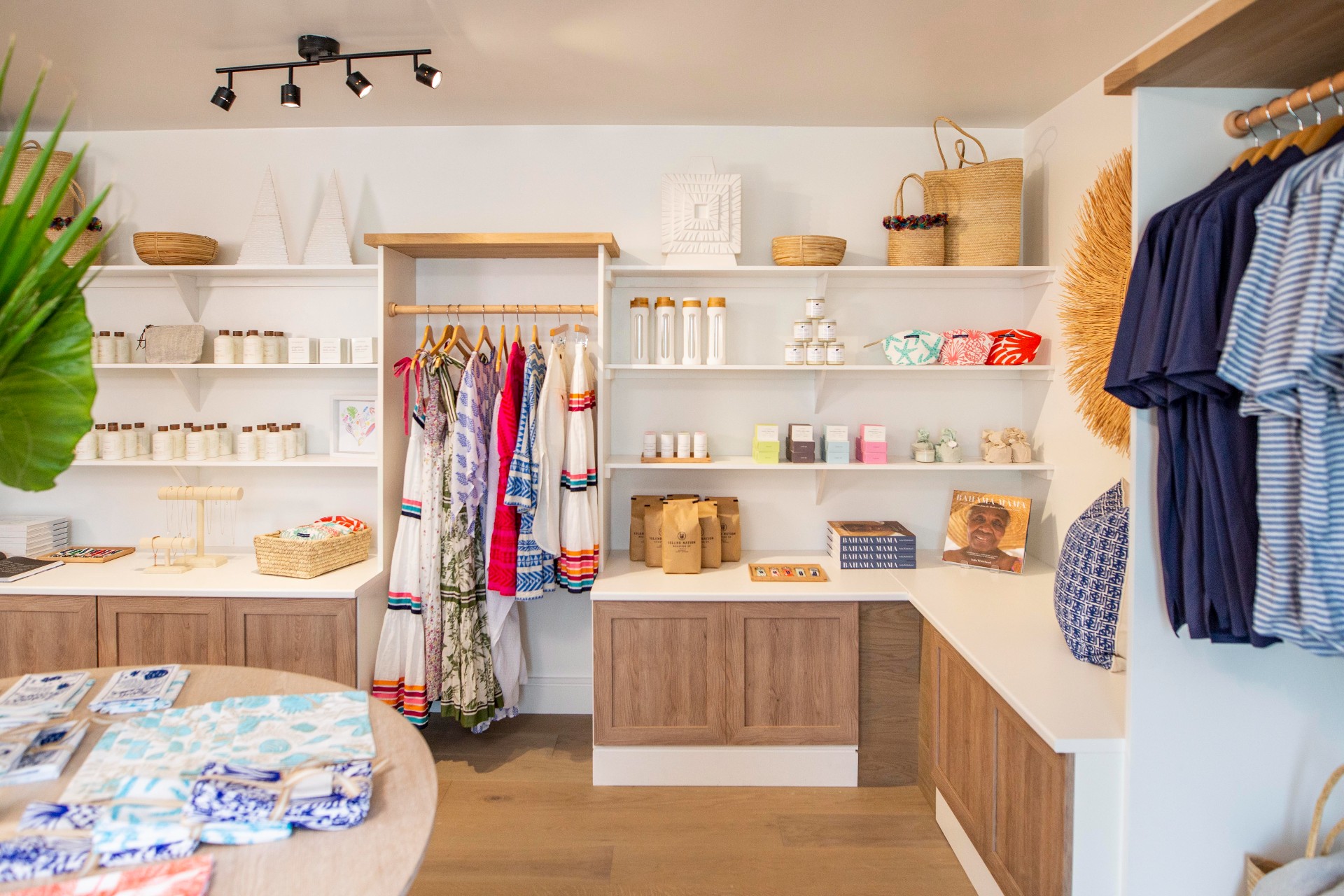 The Caerula Mar Club Boutique interior with products and clothing displayed shelves