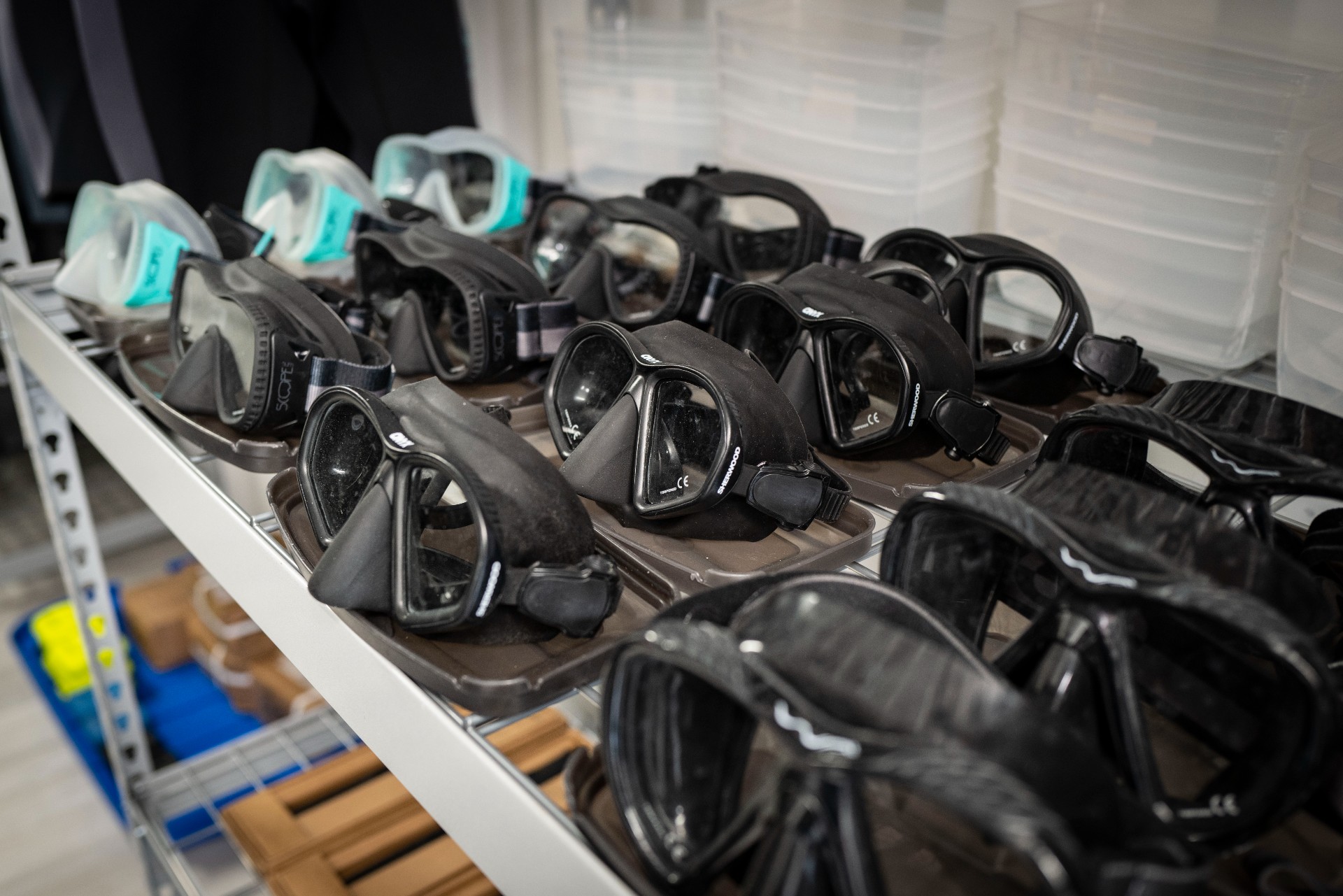 Scuba goggles displayed on shelf