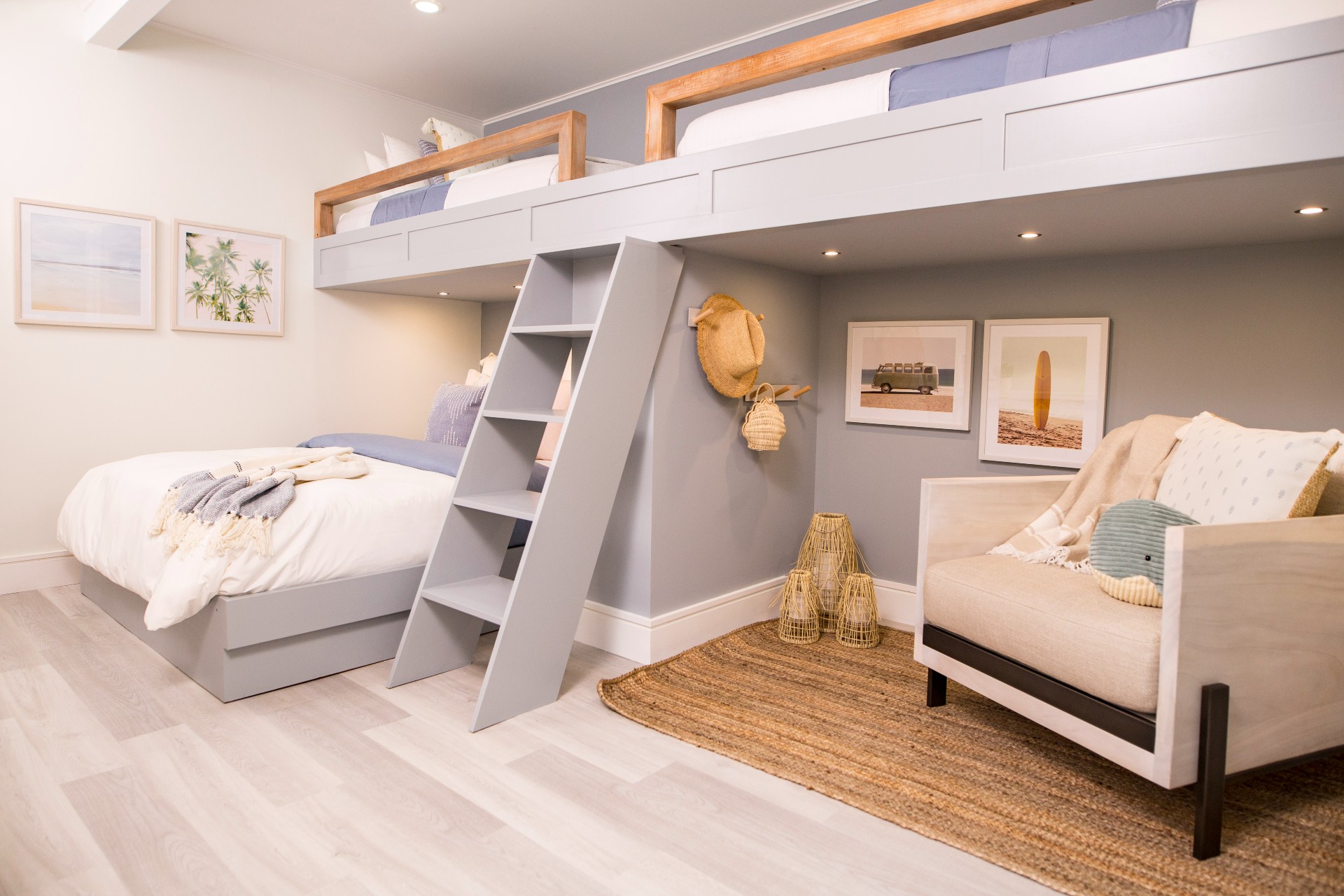 Renovated bunk room with grey walls and seating area