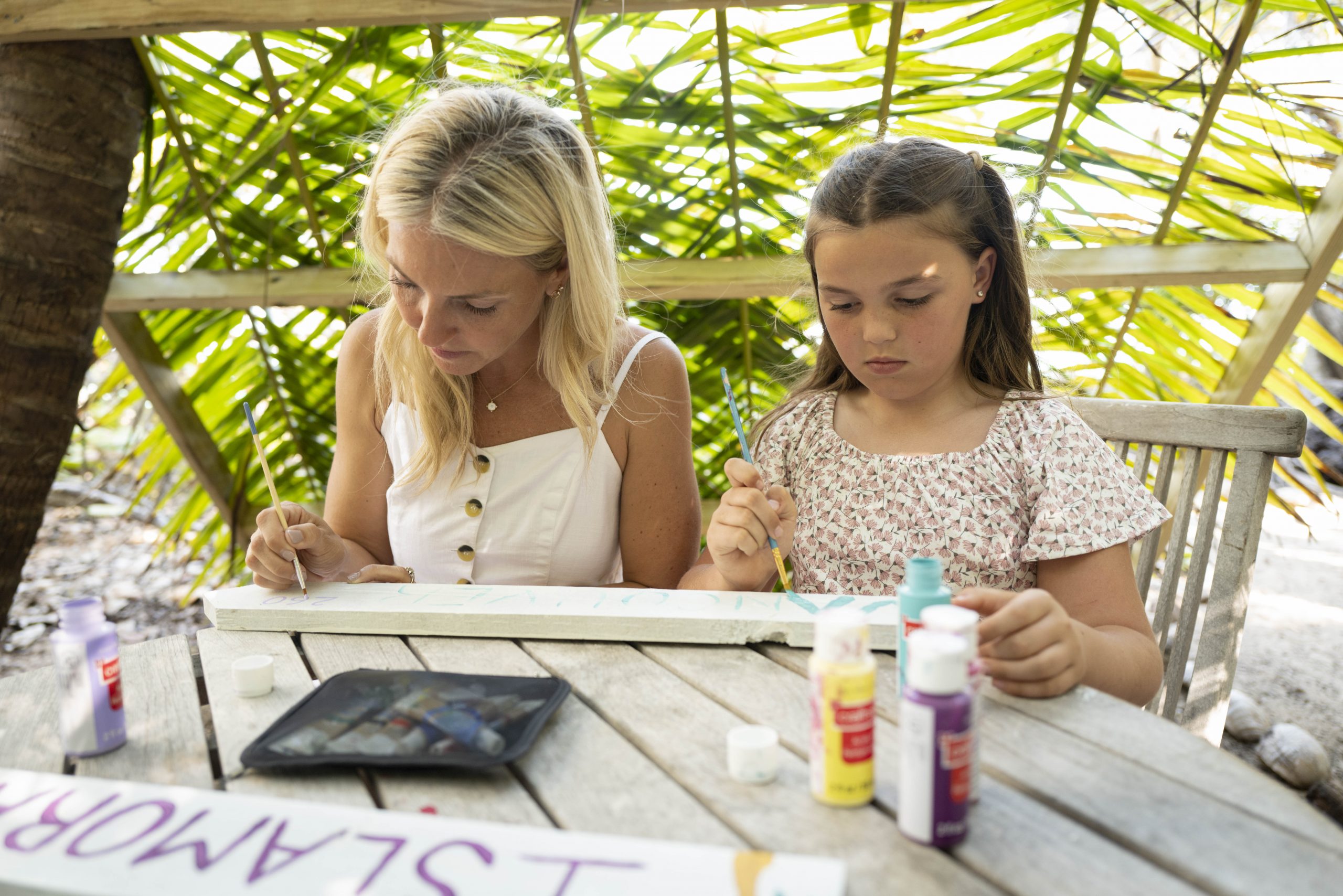 Sarah Baeumler and daughter doing crafts at table