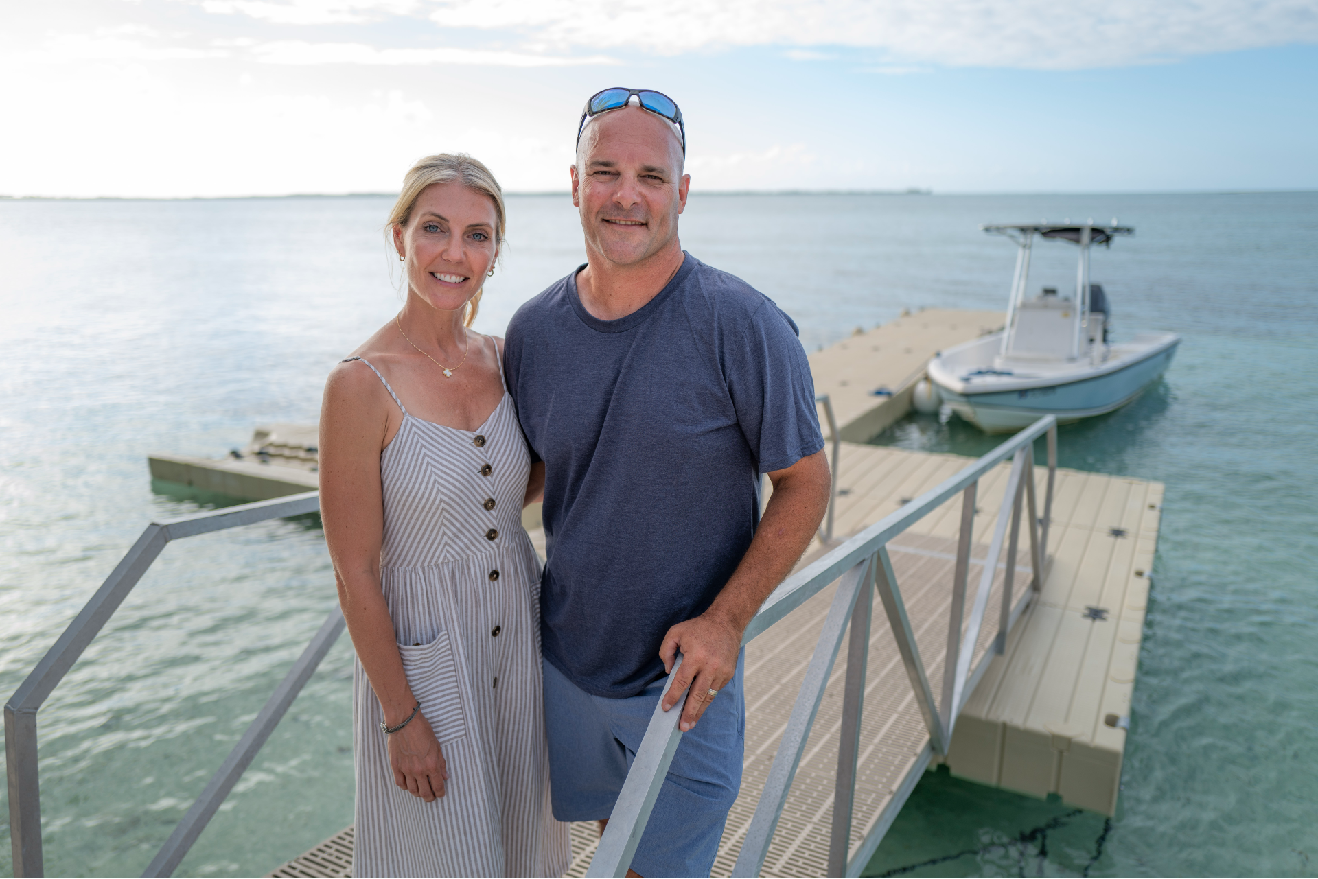 Sarah and Bryan Baeumler standing at dock