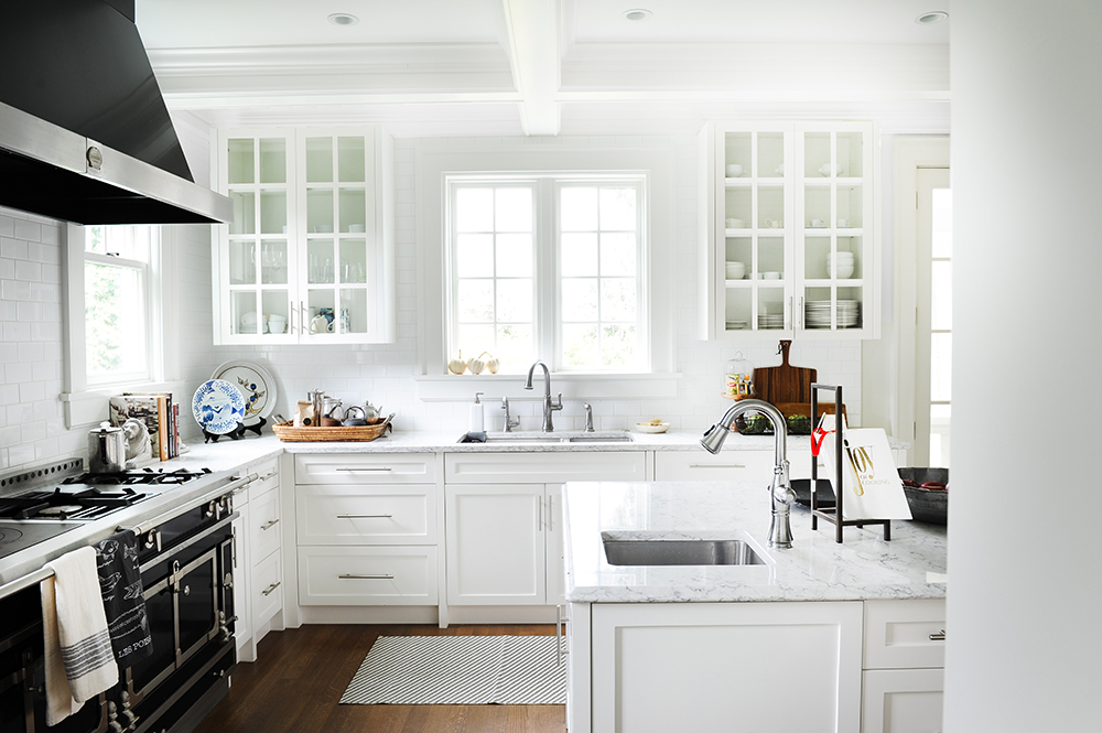Antique Flourishes Modern white kitchen in Vancouver heritage home