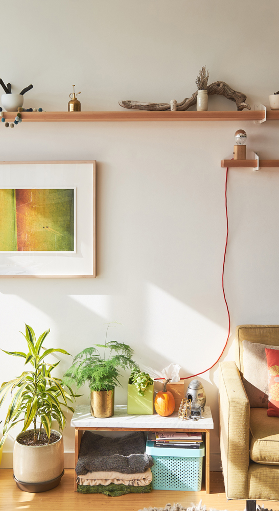 sunny high placed shelves with light cord on wall