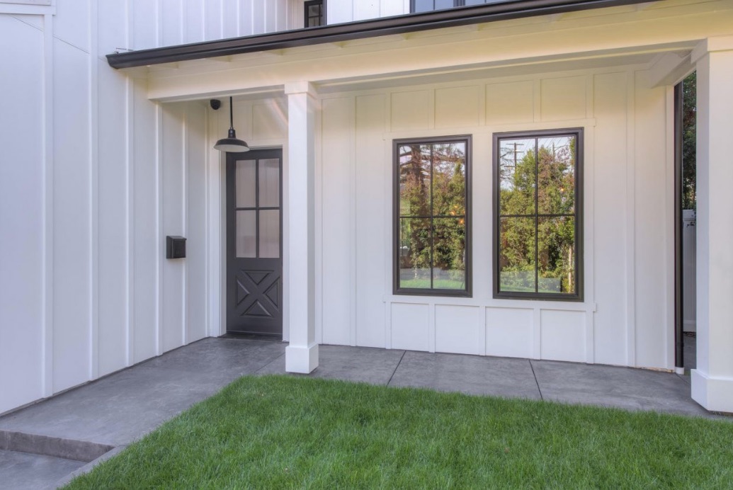 The front porch leading to the front door