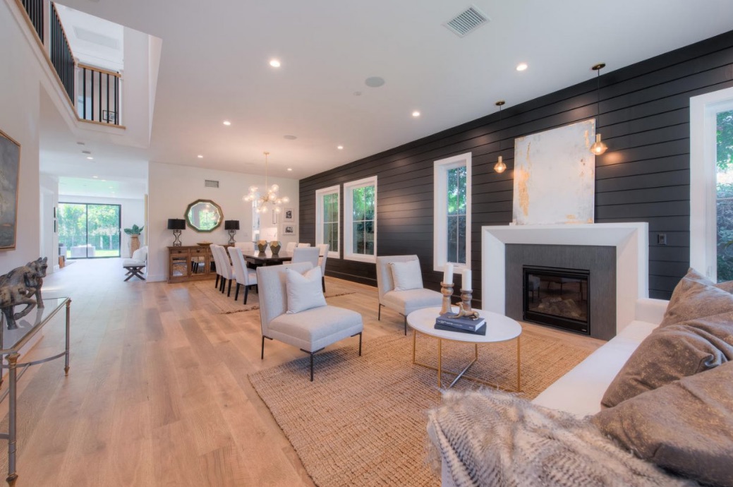 An open-concept living room on the main floor opening to the dining room