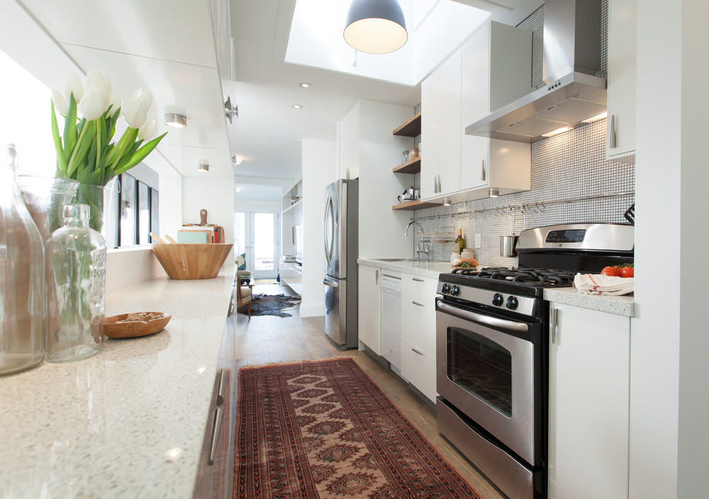 Warm Welcome Modern white kitchen with cozy elements.