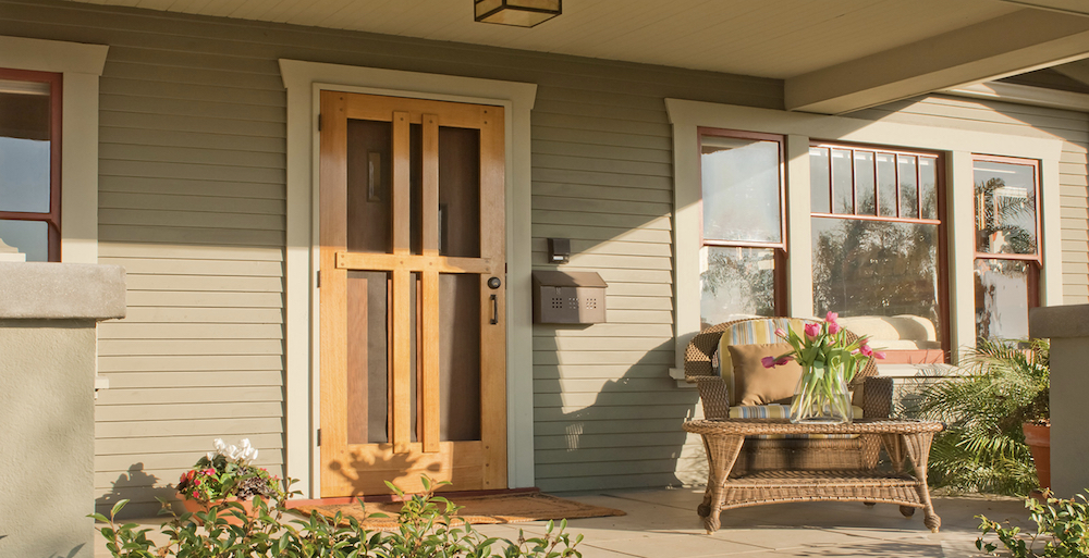 Classic craftsman house painted sage green with BEHR Livingston N330-5 with cream and red trim in BEHR Navajo White 22 and Red Chipotle S160-7