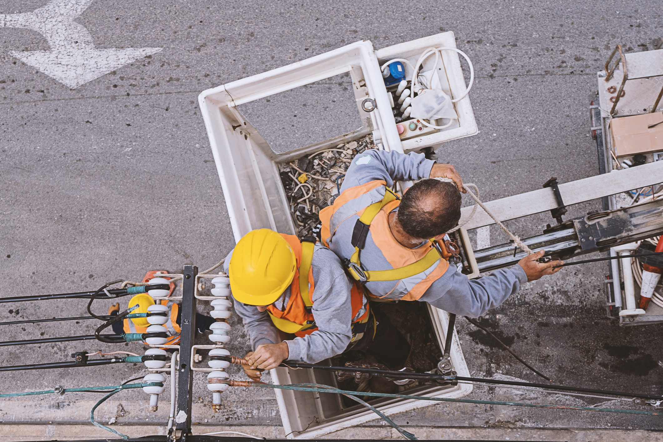 Workers on a power line