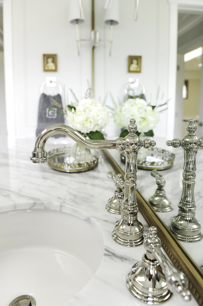 Polished nickel bathroom fixtures.