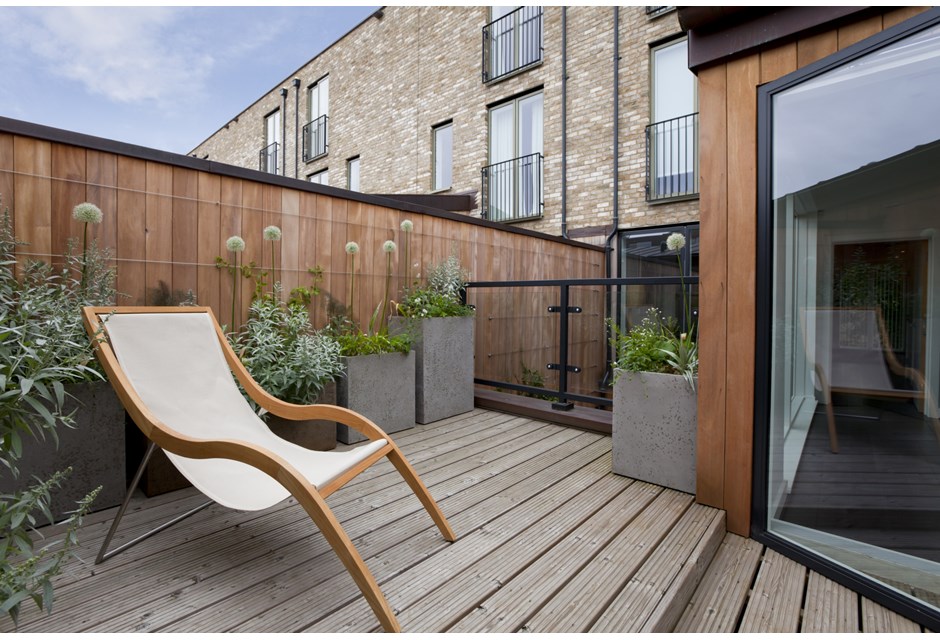 Unique patio furniture in an urban backyard