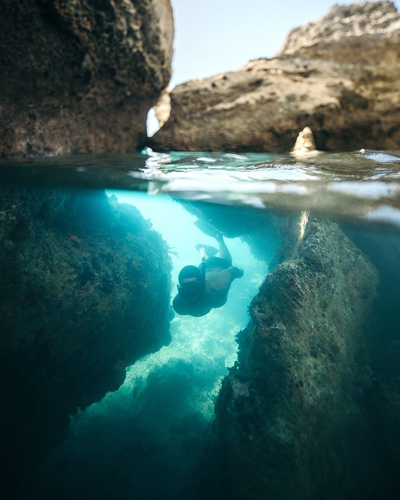 A swimmer with snorkel gear in Bahamas