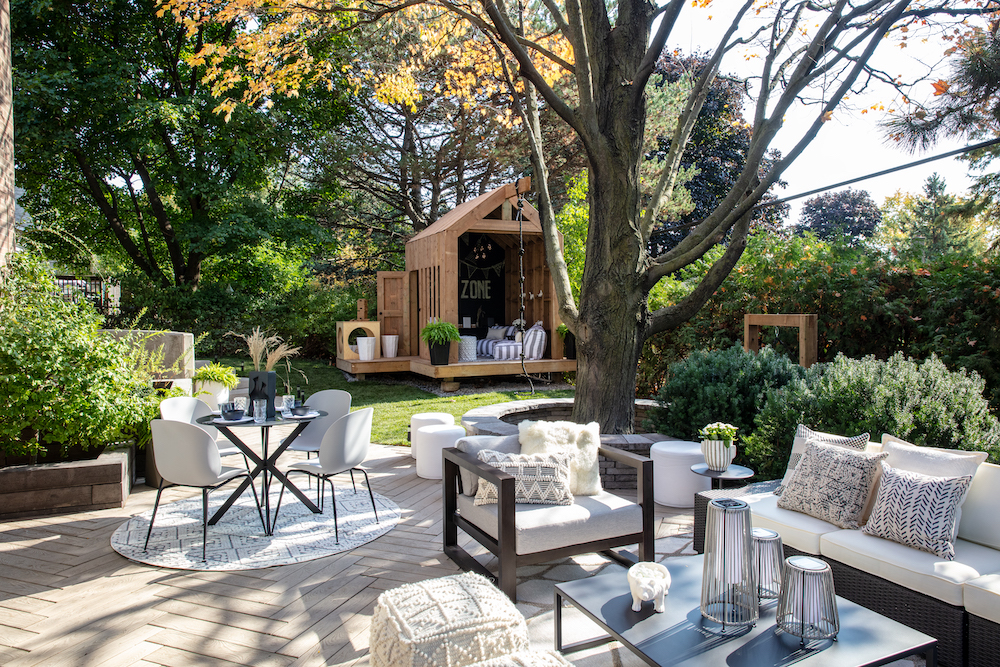 backyard with outdoor lounge space and clubhouse in background