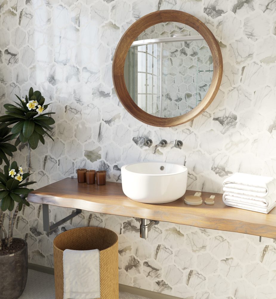 A wall-mounted wood vanity against a marble backdrop