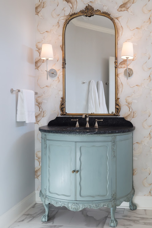 Quaint teal furniture repurposed as bathroom vanity