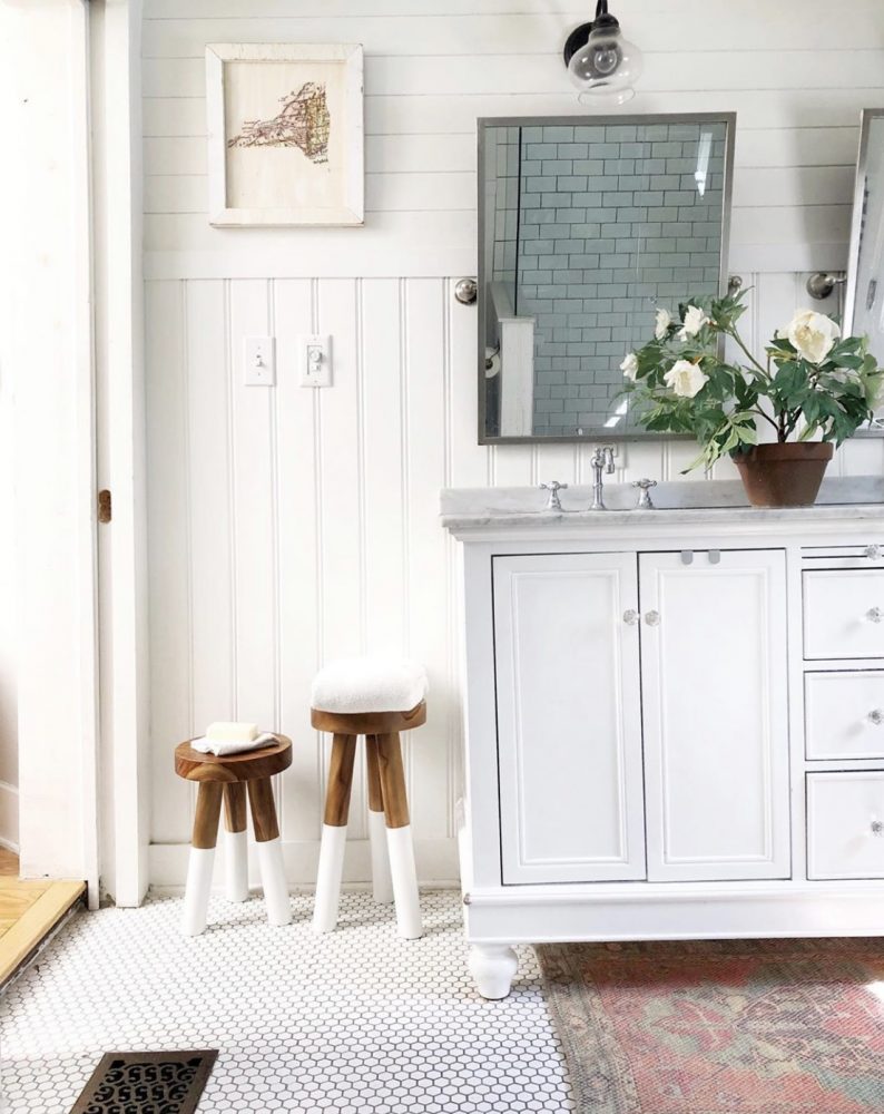 Cottagey bathroom with wainscotting and shiplap walls