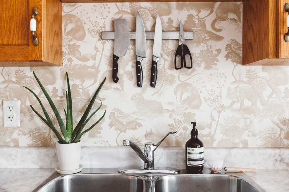 Woodland creatures backsplash in kitchen