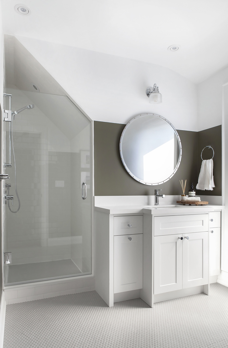 Third-floor bathroom with sloped ceiling and standing shower