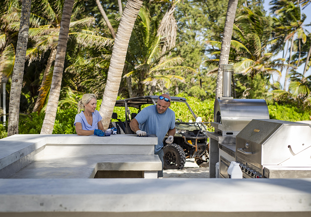 Bryan and Sarah working on the cement outdoor dining bar.