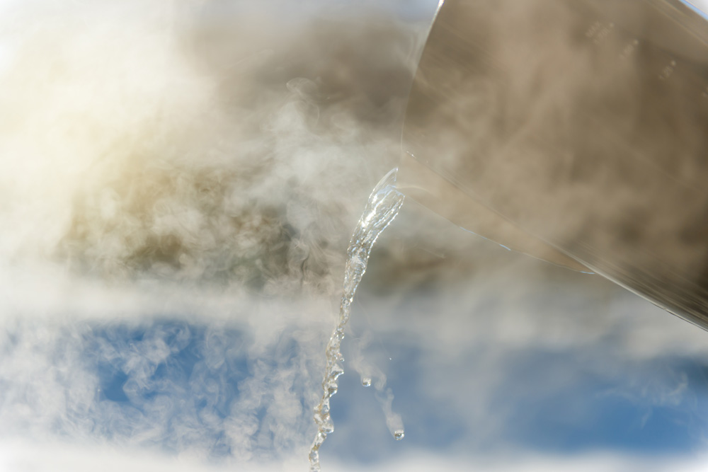 Pouring water from a kettle