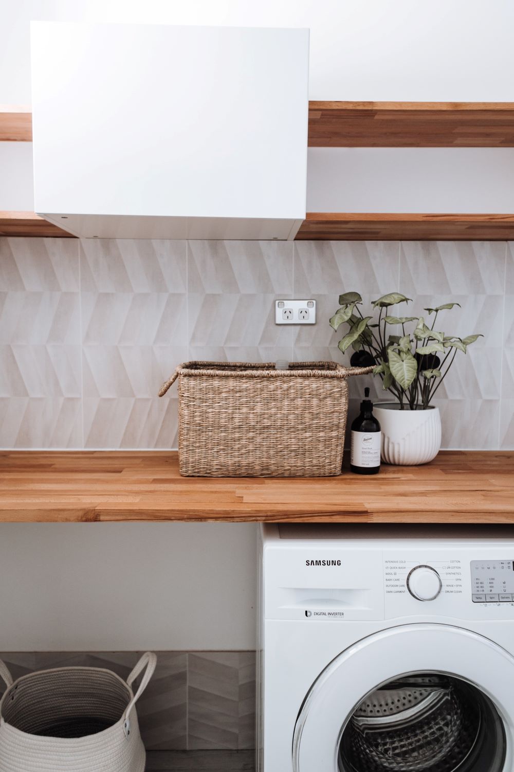 Front load washer in a laundry room