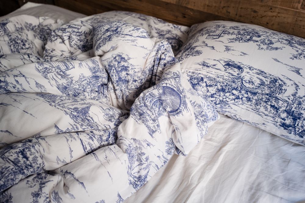 Blue duvet cover on bed