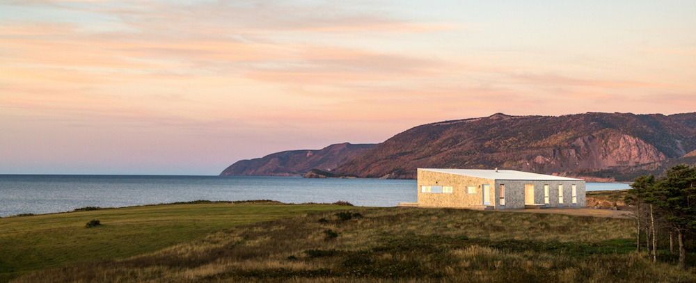 beige prefabricated home on grass