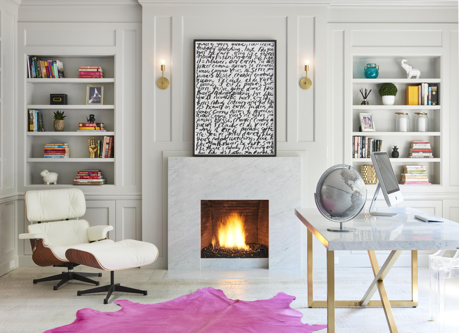 Elegant inset bookshelves in panelled home office