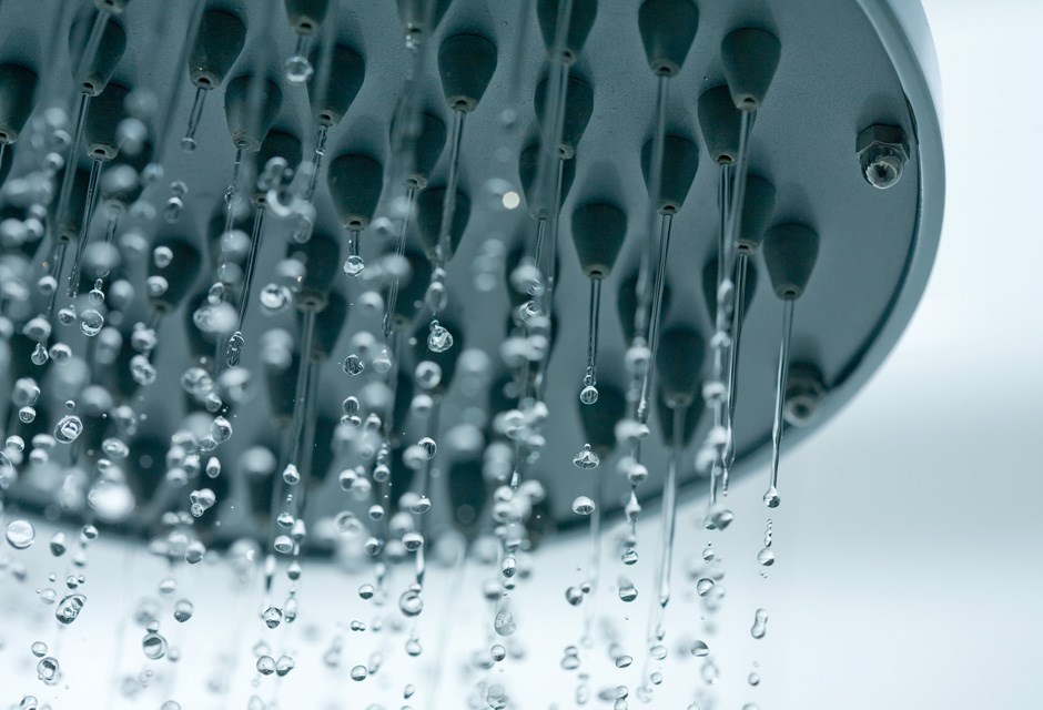 Bathroom showerhead turned on