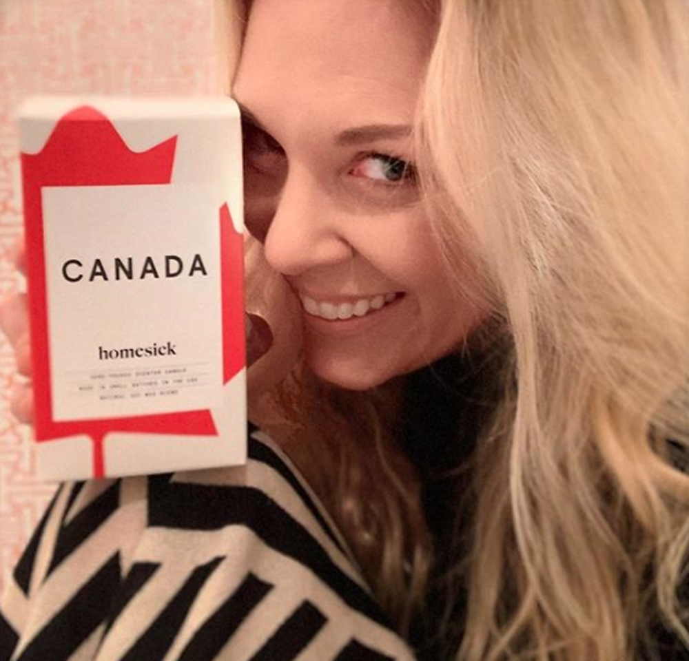 Kortney Wilson holding Canada candle