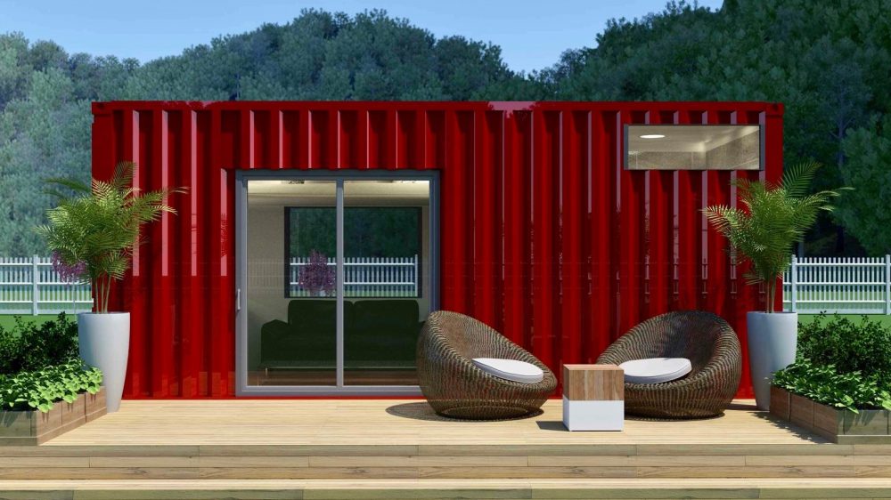 Bright red storage container home with wicker outdoor furniture on patio