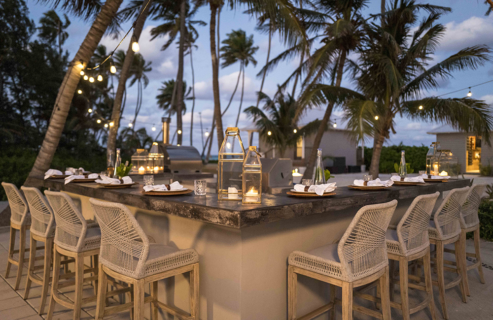 An evening look at the well laid out dining bar at the Island of Bryan resort.