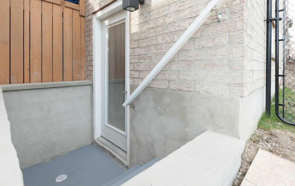 Basement entrance leading down a few stairs.