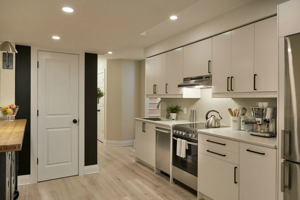 Basement apartment featuring recessed lighting throughout the ceilings.