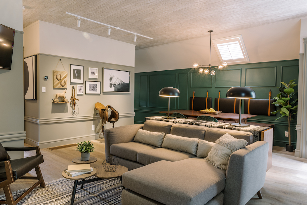 grey and green living room and dining area