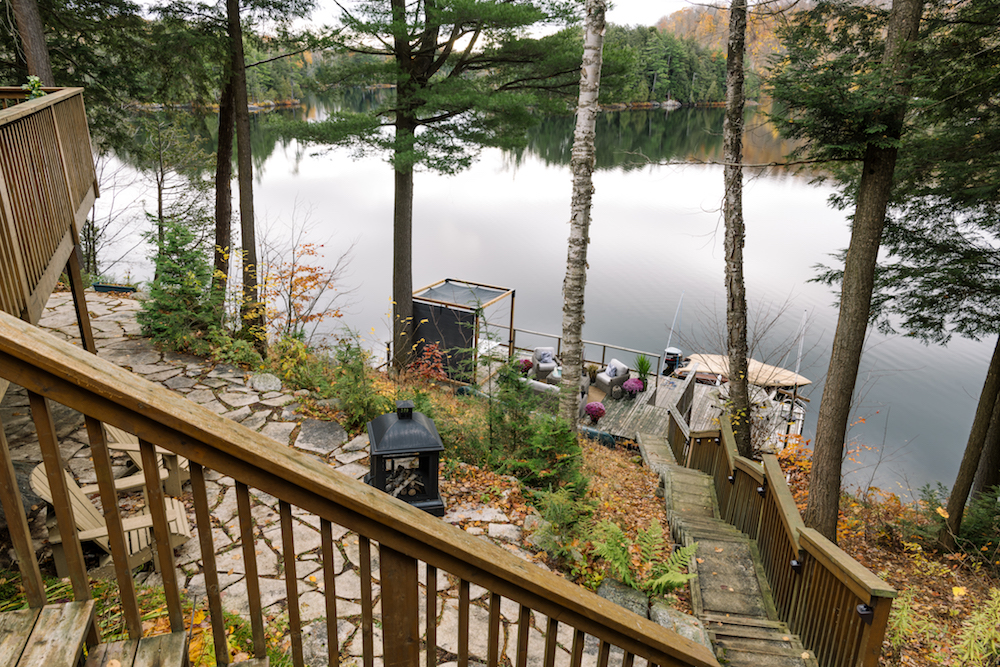 stairs leading down to dock on lake