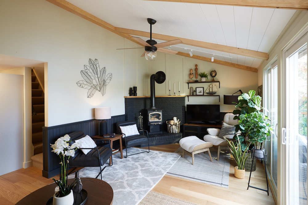 white living room with white shiplap ceiling