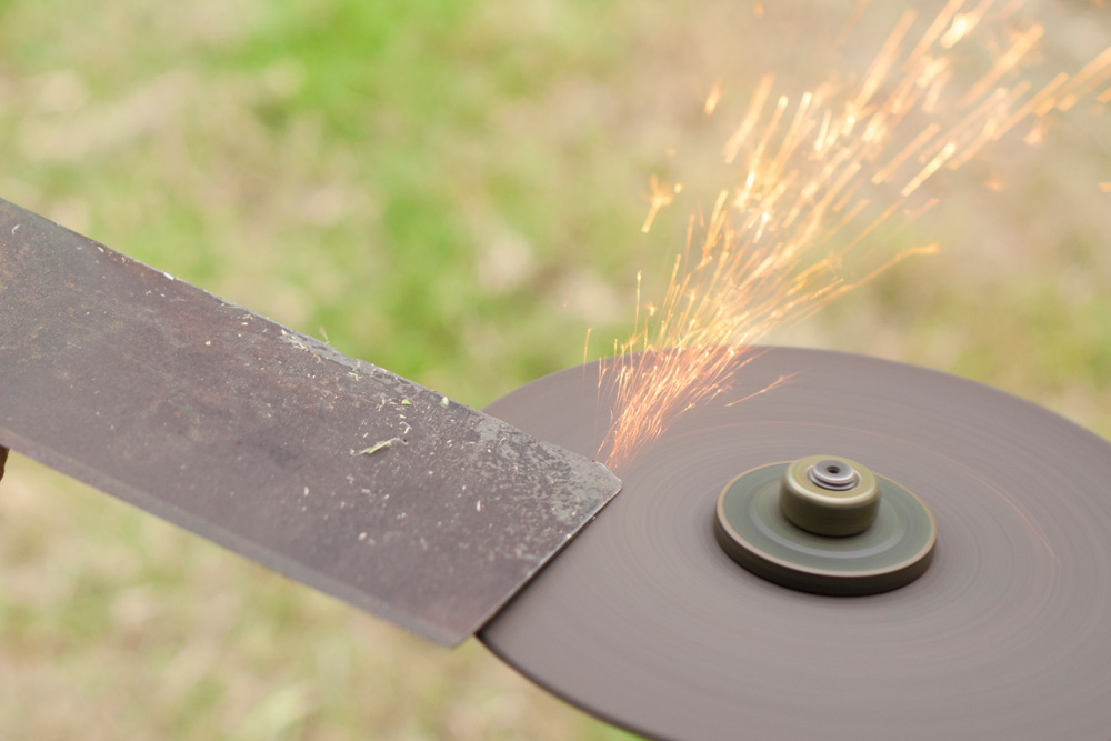 Sharpening a lawn mower blade