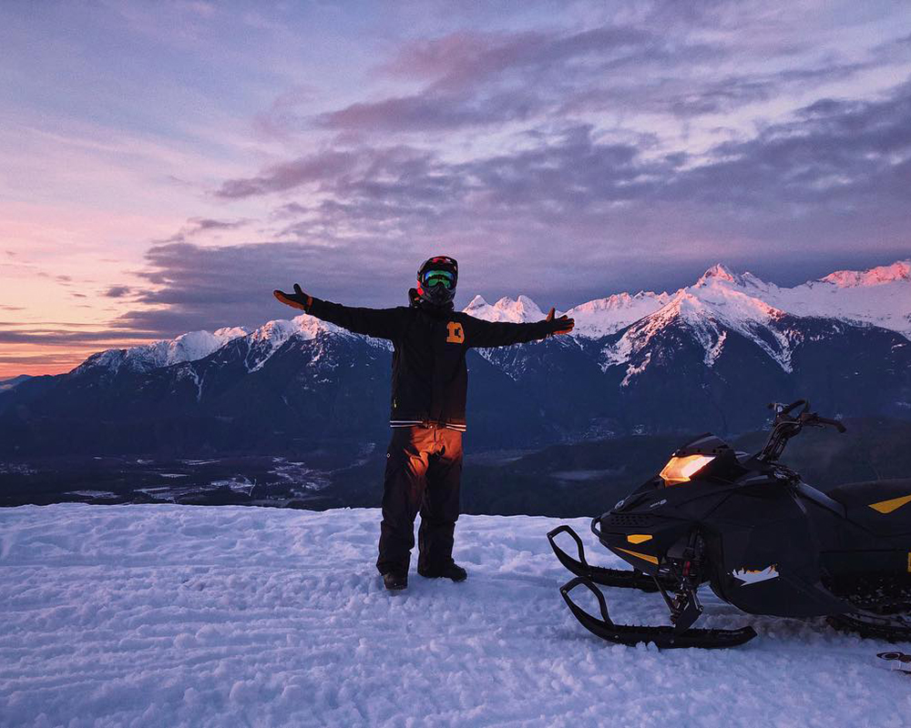 Sabrina Smelko snowmobiling in British Columbia