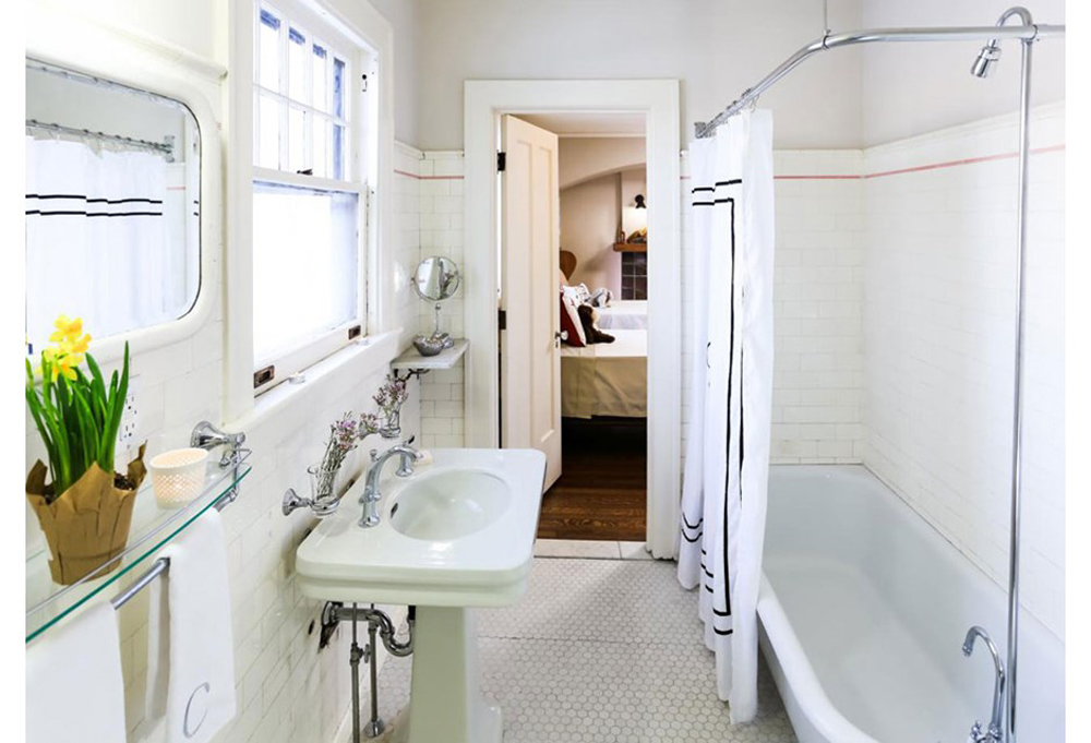 White bathroom with curved sink