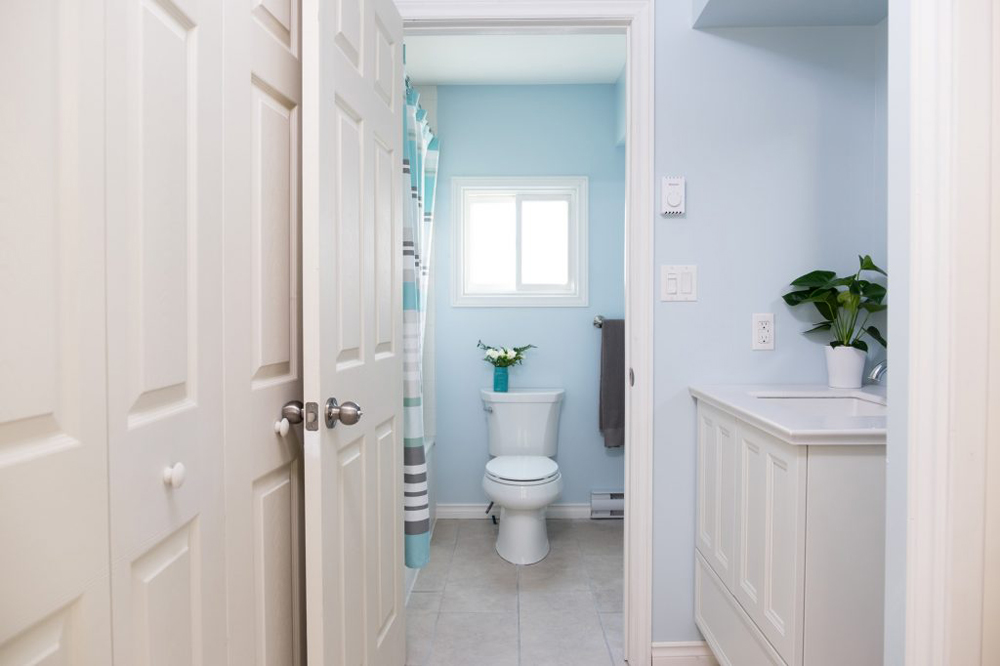 Bathroom with sink outside in nook/hallway