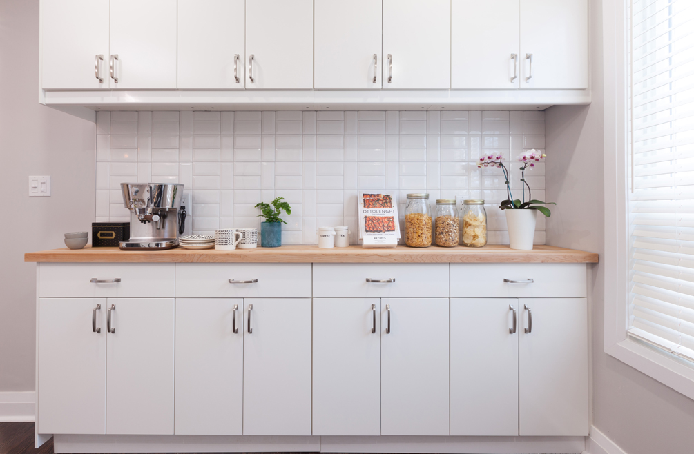 White kitchen backsplash installed in different positions for a varied look.