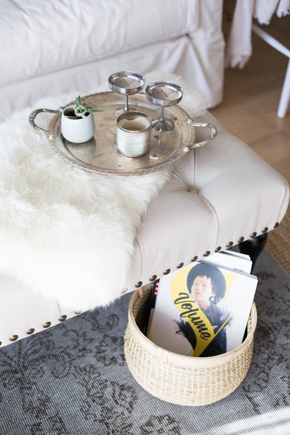 Storage basket under ottoman